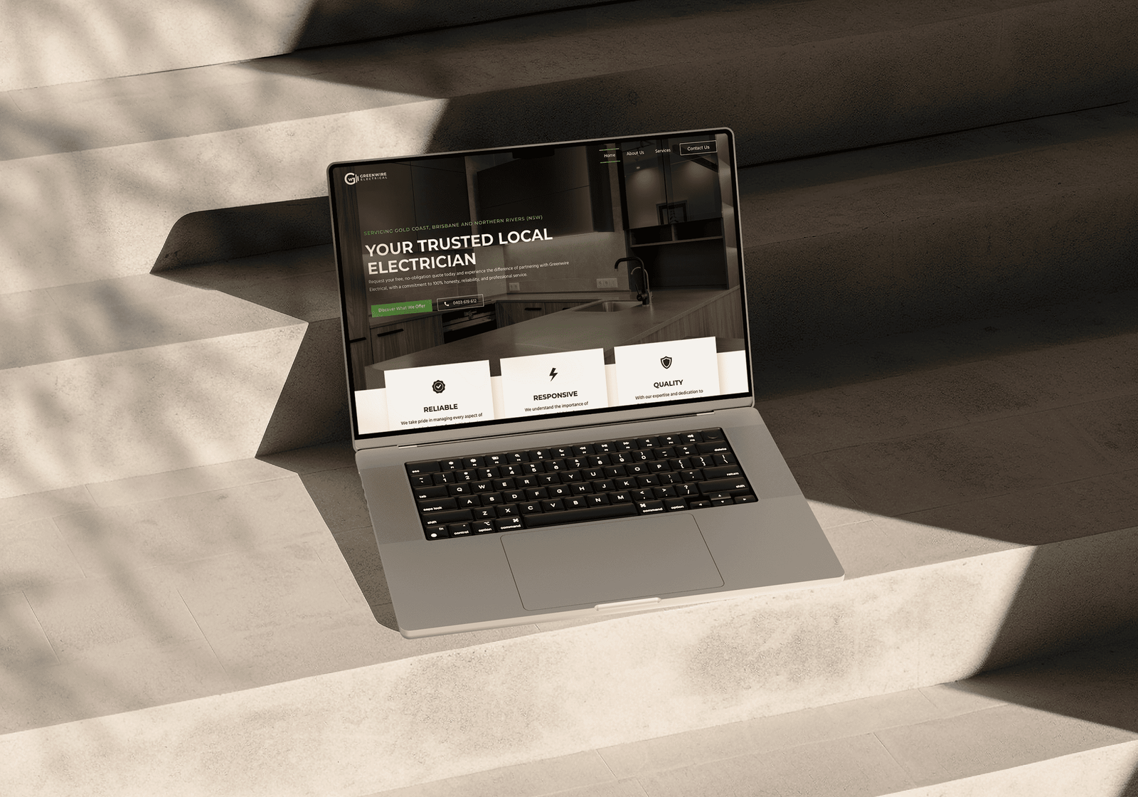 laptop stairs with greenwire electrical website